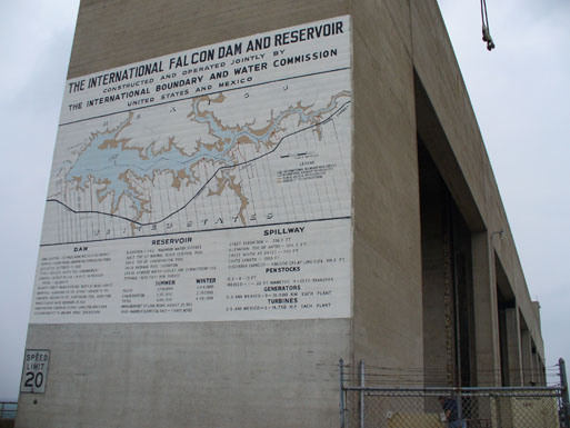 Map and information for Falcon Dam painted on the side of the spillway gate structure